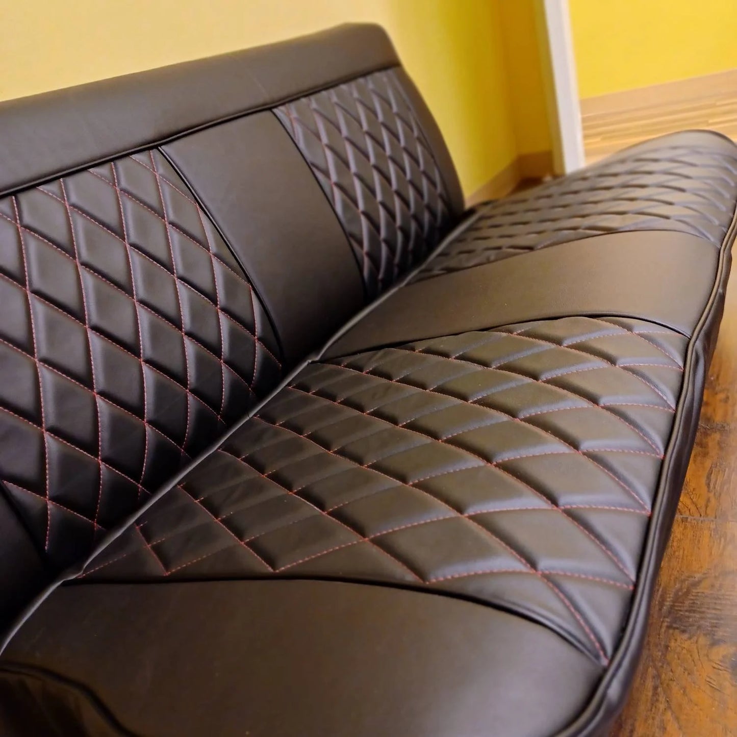 Red stitched bench seat cover