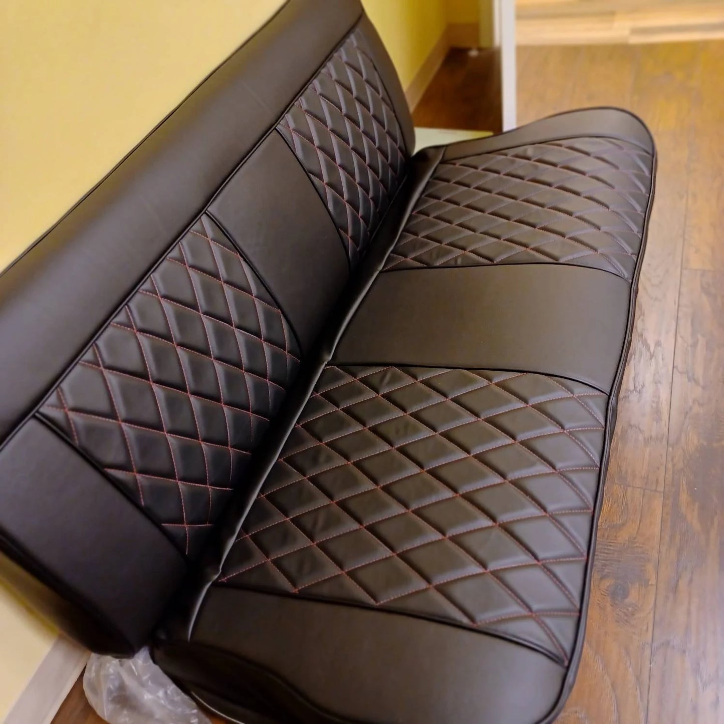 Red stitched bench seat cover